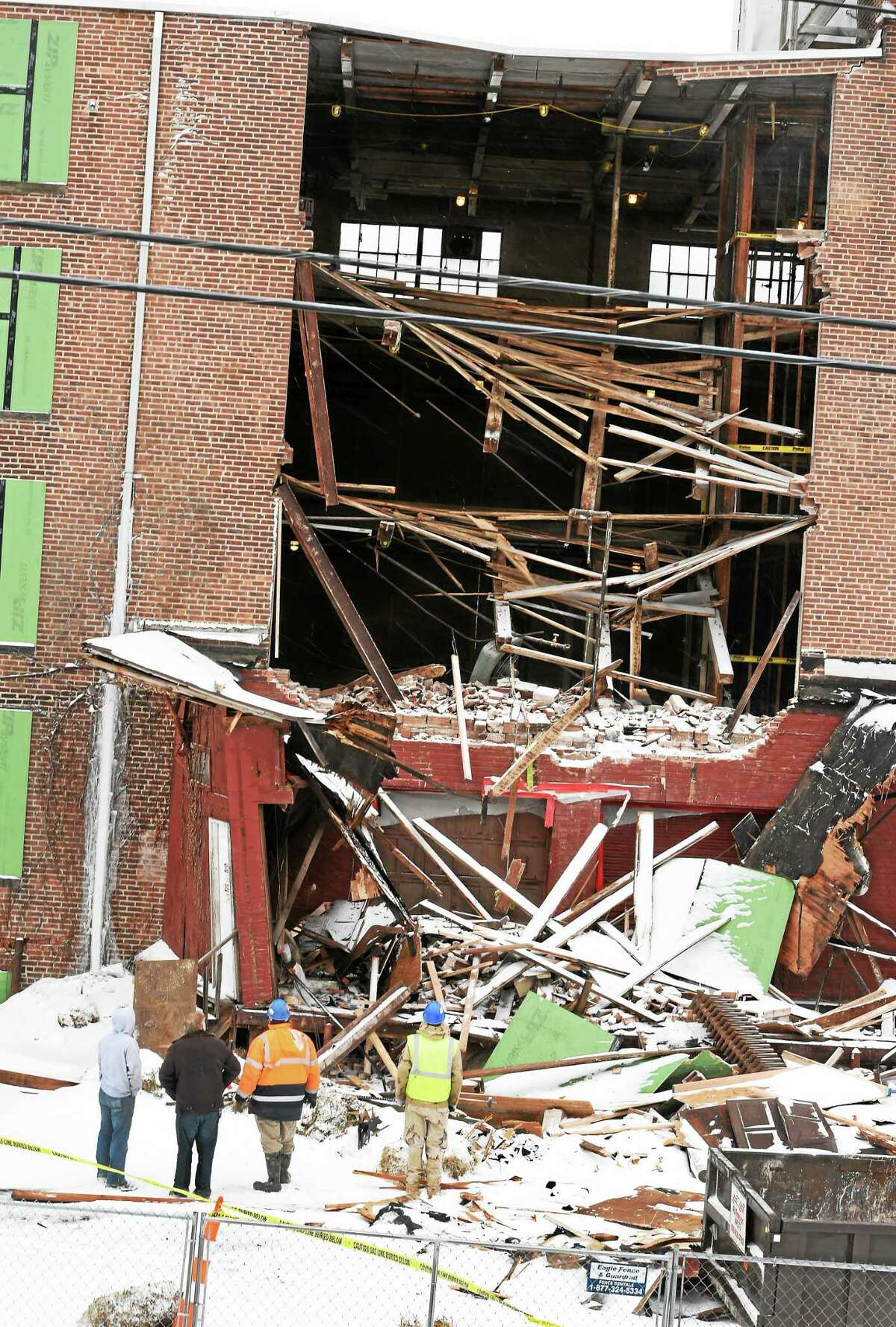 Nobody was hurt in a partial building collapse at Former Carroll Cut-Rate Furniture store Monday at 222 Boston Post Road in West Haven. The top three floors collapsed as workers were removing a loading dock.