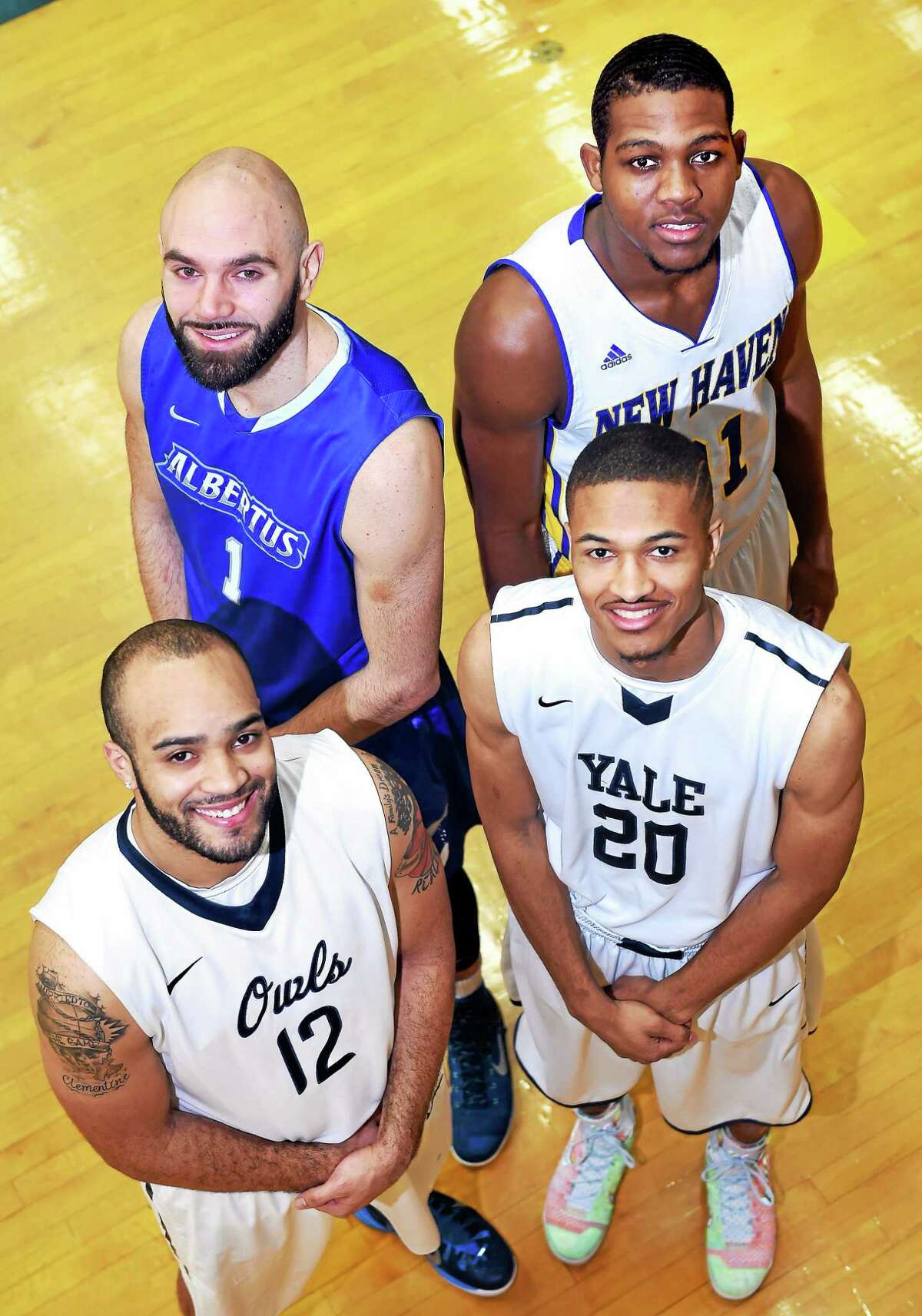 Clockwise from bottom left, Tylon Smith of SCSU, Victor Ljuljdjuraj of Albertus Magnus, Eric Anderson of UNH and Javier Duren of Yale.