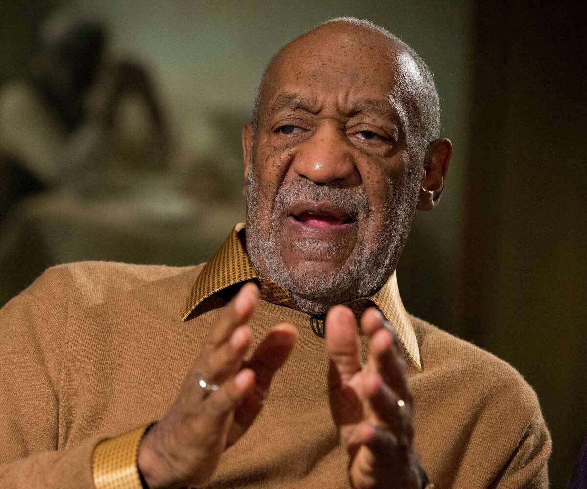 In this Nov. 6, 2014 photo, entertainer Bill Cosby gestures during an interview about the upcoming exhibit, “Conversations: African and African-American Artworks in Dialogue,“ at the Smithsonian’s National Museum of African Art, in Washington.