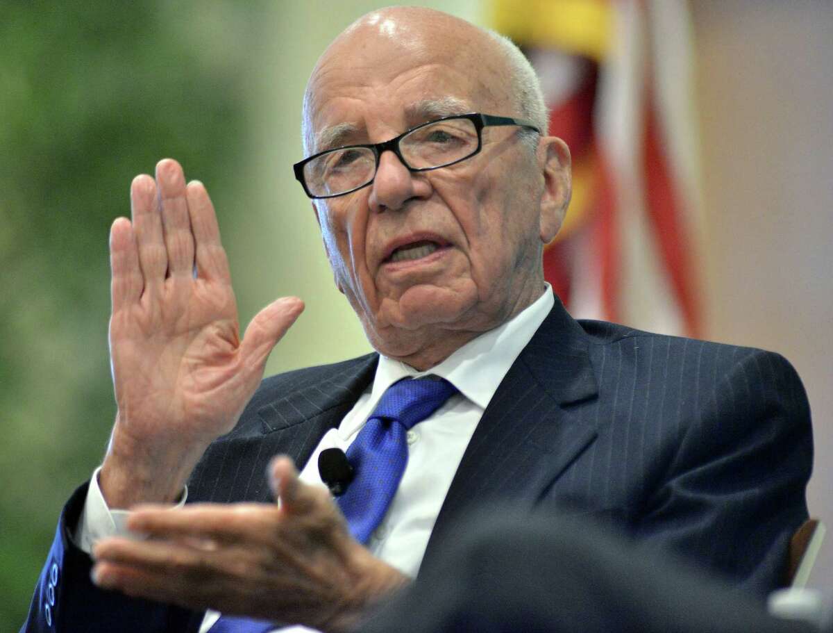FILE - In this Aug. 14, 2012 file photo, Rupert Murdoch speaks during a forum on The Economics and Politics of Immigration, in Boston. Murdoch, 84, is preparing to hand over the CEO job at Twenty-First Century Fox Inc. to his son, James, according to multiple media reports Thursday, June 11, 2015. (AP Photo/Josh Reynolds, File)