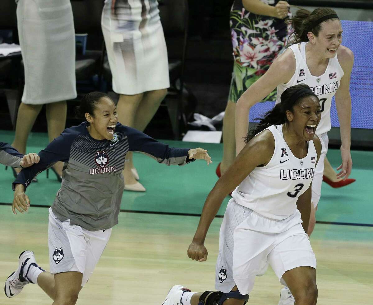 UConn forward Morgan Tuck (3) rushes the court at the conclusion of the Huskies’ 63-53 win over Notre Dame on Tuesday in the national championship game in Tampa, Fla.