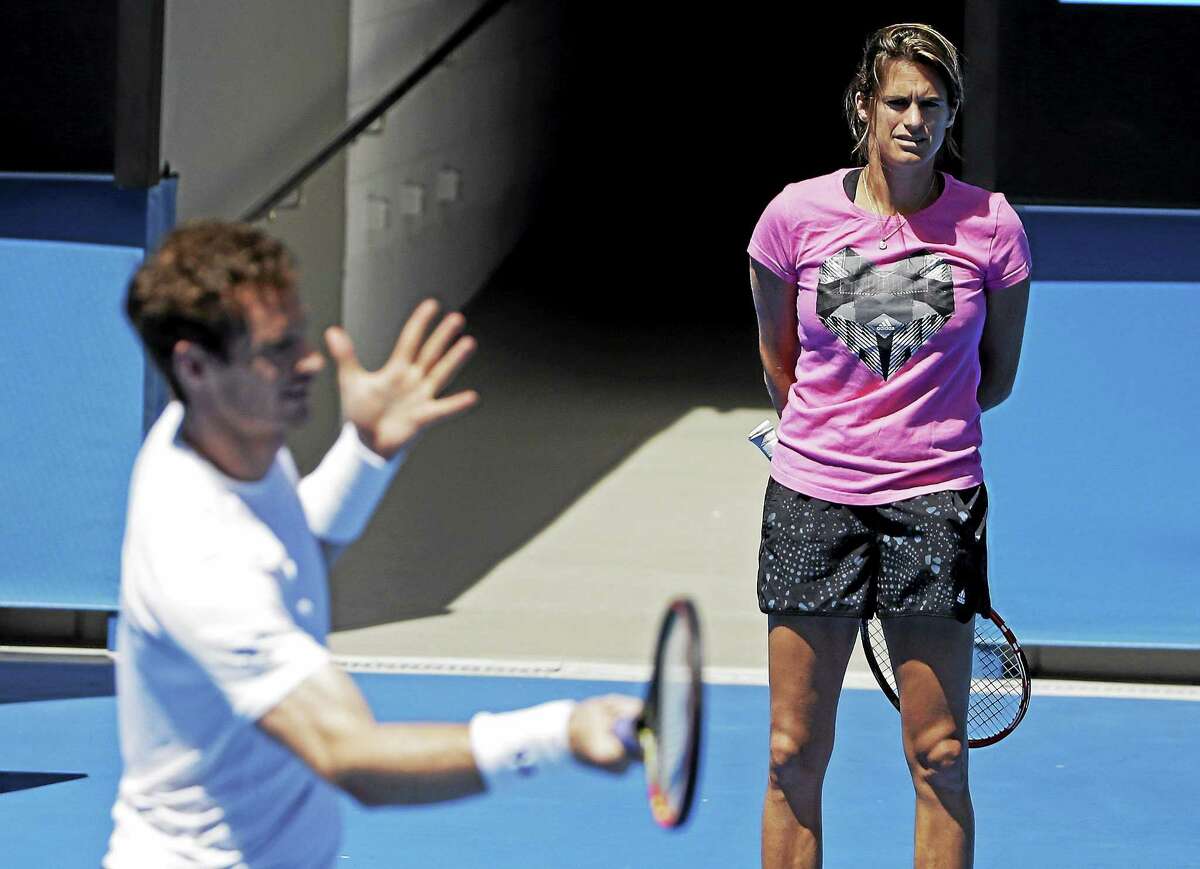 Andy Murray practices as his coach, Amelie Mauresmo, looks on ahead of the men’s singles final at the Australian Open in January.