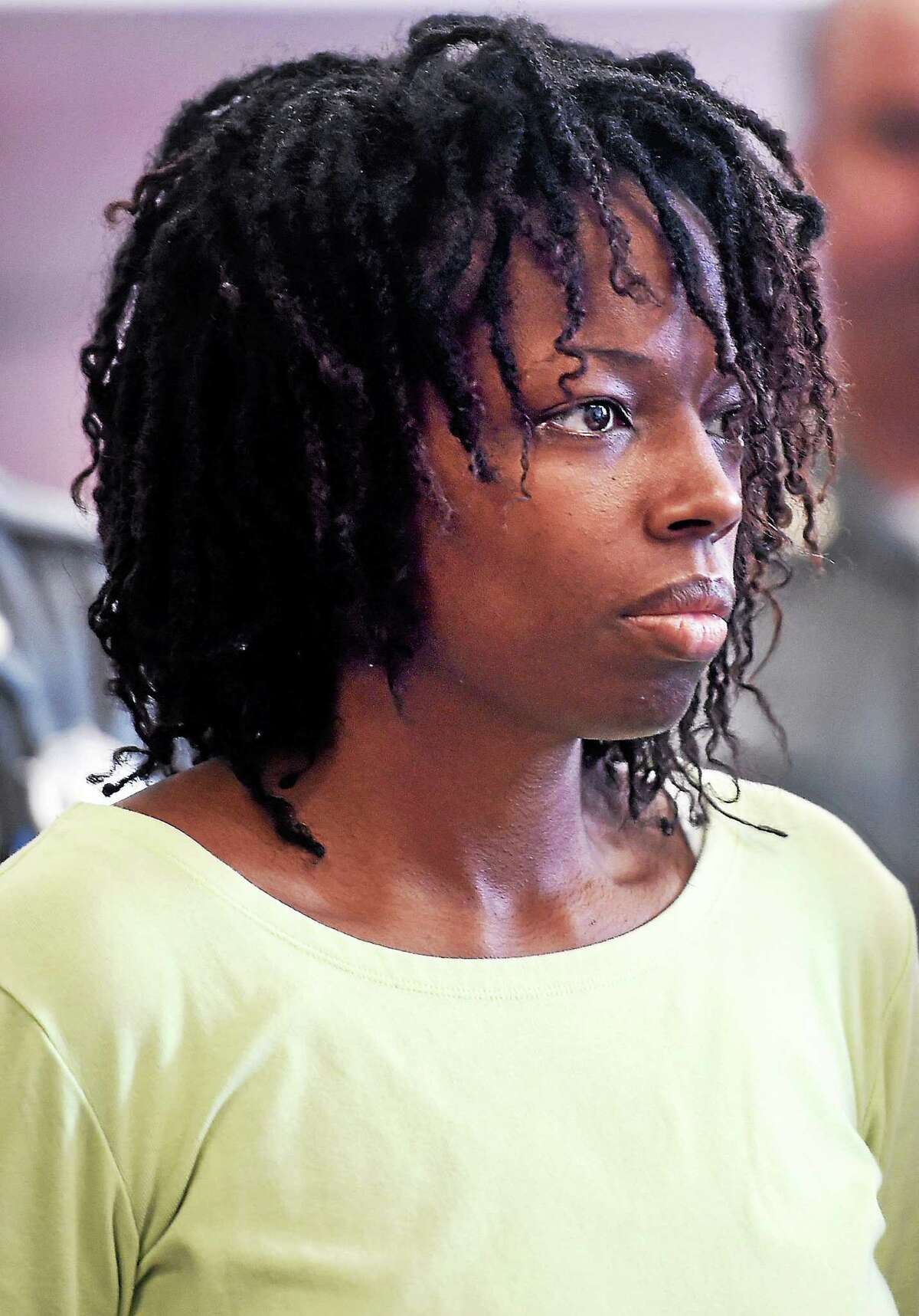 (Arnold Gold-New Haven Register) LeRoya Moore of East Haven is arraigned in Superior Court in New Haven for the two counts murder and three counts of first degree reckless endangerment on 6/10/2015.