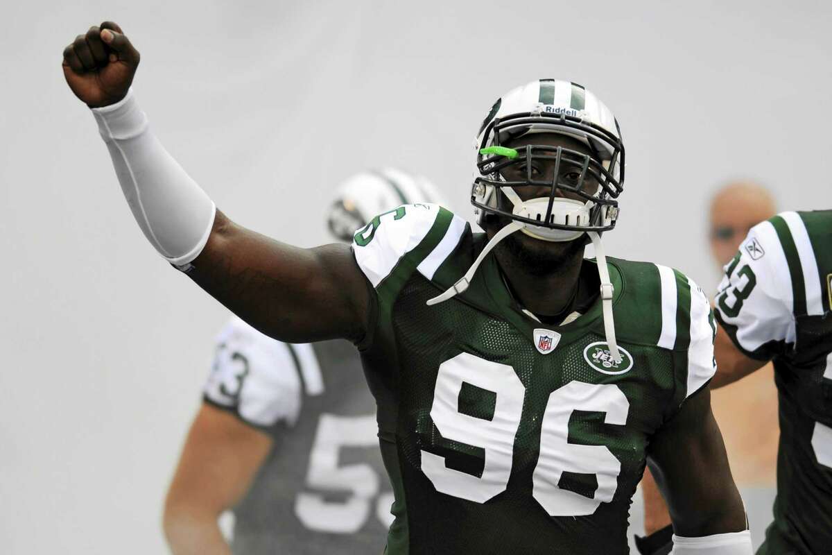 New York Jets defensive end Muhammad Wilkerson reported to the team’s mandatory minicamp.