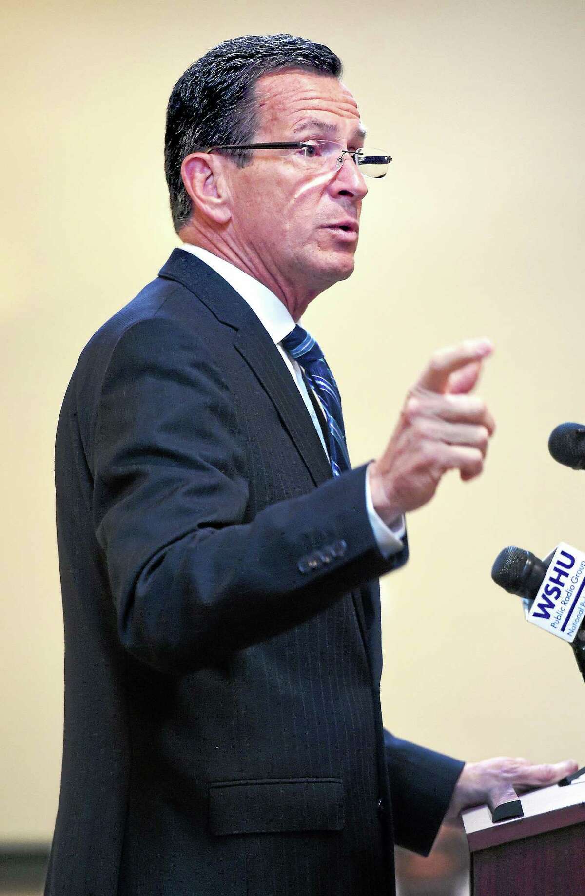 In this Sept. 15, 2014 file photo, Gov. Dannel P. Malloy speaks at a transportation forum in North Haven.