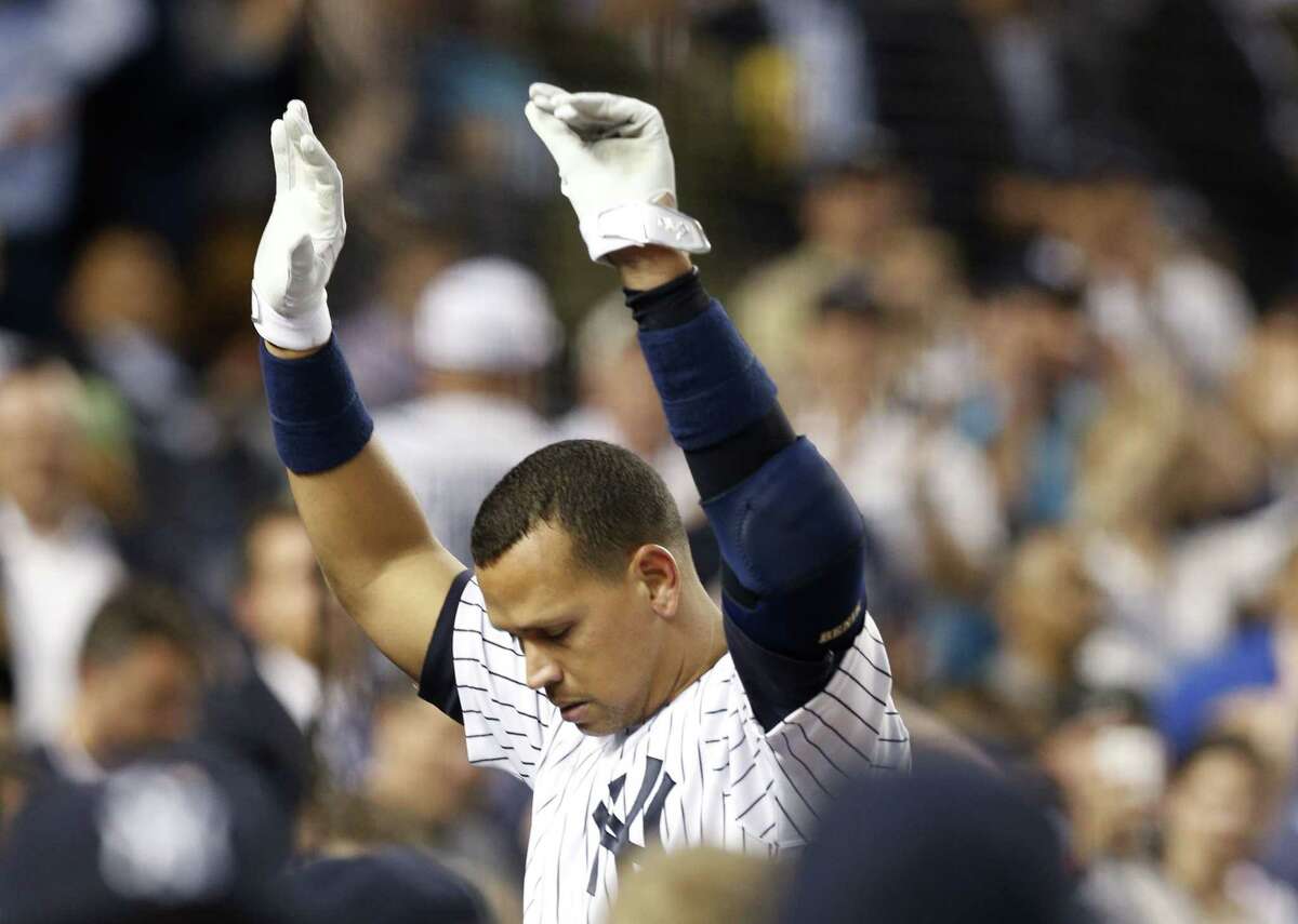 Yankees designated hitter Alex Rodriguez takes a curtain call after hitting his 661st home run and surpassing Willie Mays on the all-time home run list Thursday.