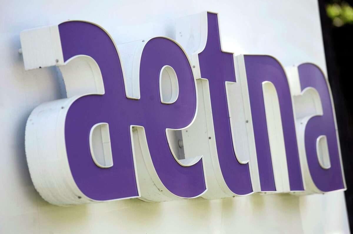 A sign for Aetna Inc., is on display at the company headquarters in Hartford, Conn.