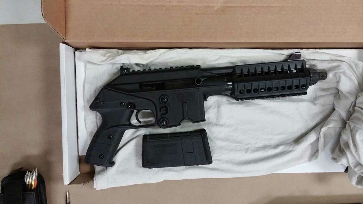 This image provided by the Prince George's (Md.) Police shows one of the weapons that police found upon searching Hong Young's home in Beltsville. Md, on Wednesday, March 4, 2015. Young, accused of firing at five public places in Maryland, including a building at the National Security Agency, chose his targets at random, police said Wednesday. Young was charged with attempted murder and assault in the first shooting Feb. 24 near a mall. Police said the other shootings were linked by ballistic evidence or surveillance video. (AP Photo/Princes George's Police)