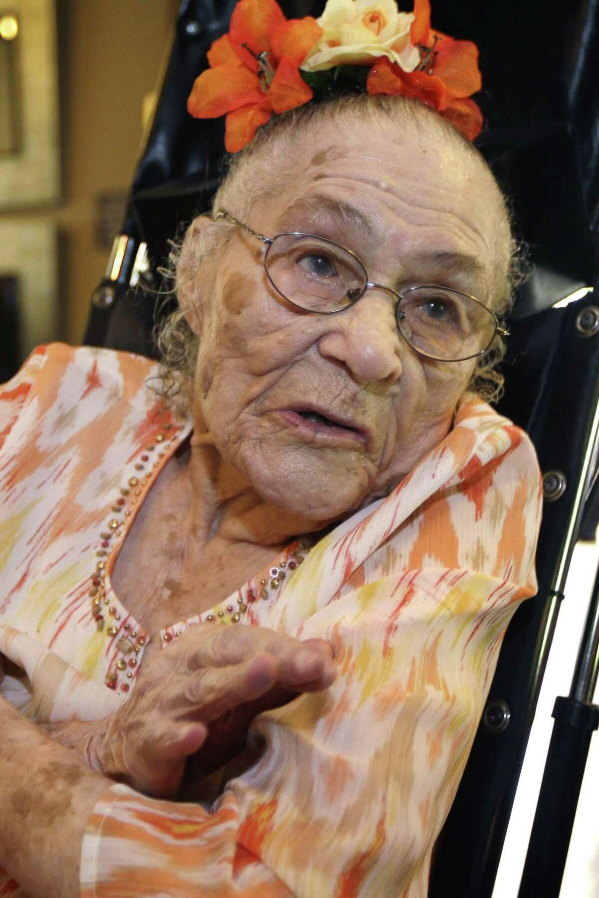 In this July 3, 2014, file photo, Gertrude Weaver poses at Silver Oaks Health and Rehabilitation Center in Camden, Ark., a day before her 116th birthday. Just days after becoming the world’s oldest documented person, 116-year-old Gertrude Weaver died Monday in Arkansas.