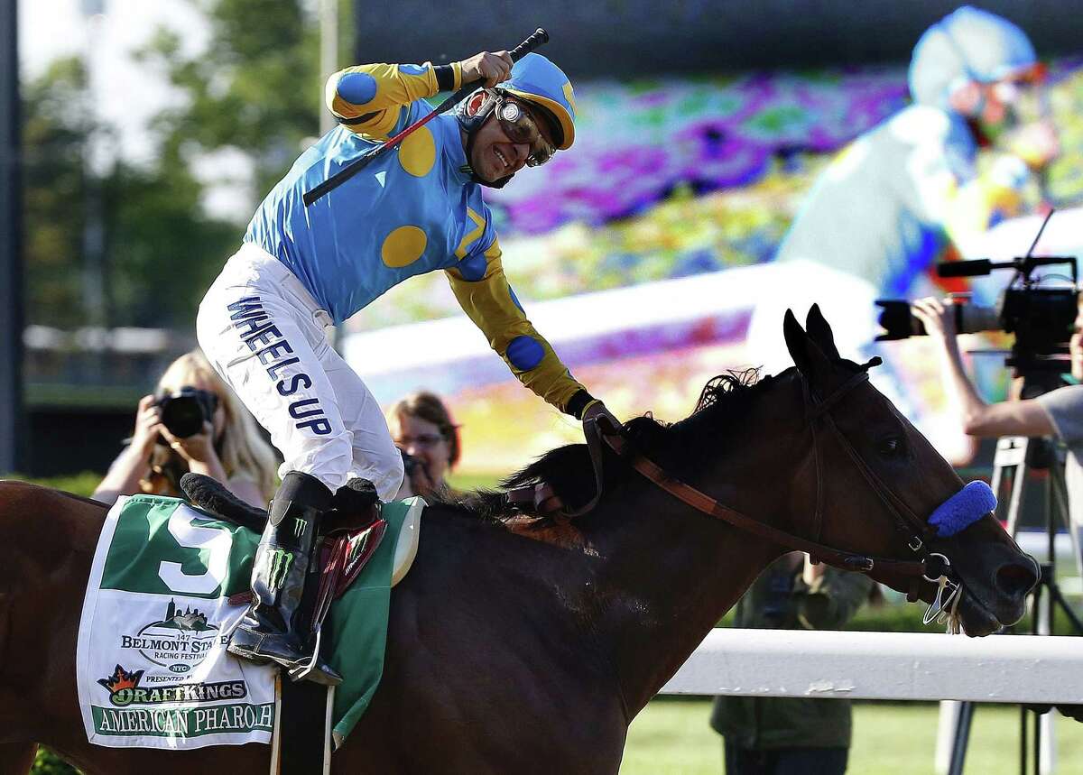 Victor Espinoza reacts after crossing the finish line with American Pharoah to win the 147th running of the Belmont Stakes on Saturday at Belmont Park in Elmont, N.Y.