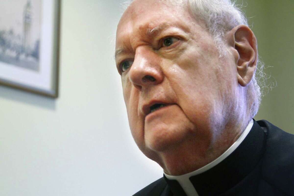 FILE- In this Aug. 19, 2011 file photo, Cardinal Edward Egan speaks with a reporter during an interview in New York. Egan, who was Archbishop-Emeritus, 12th bishop and 9th archbishop and 7th Cardinal of the See of New York, died of cardiac arrest, Thursday, March 5, 2015, in New York. He was 82.