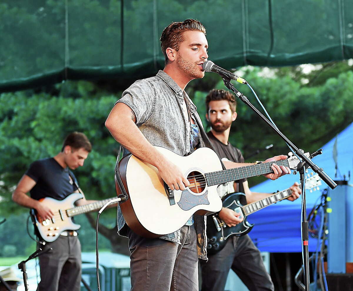 File photo: The band, ‘Beach Avenue,’ led by Nick Fradiani, rocks the crowd at the Hamden Town Center Park as they open up for Fran Cosmo, former lead singer of ‘Boston.’