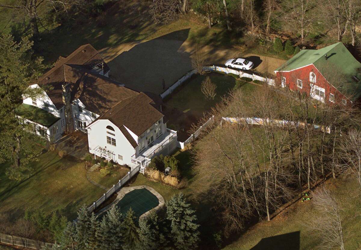 FILE - In this Jan. 5, 2000, file photo, the President Bill Clinton and Hillary Rodham Clinton's home is seen from the air in Chappaqua, N.Y. The server computer that transmitted and received Hillary Clintonís emails on a private account she used exclusively for official business when she was secretary of state traced back to a residential Internet service registered at her familyís five-bedroom home in Chappaqua, according to Internet records reviewed by The Associated Press. (AP Photo/Kathy Willens, File)