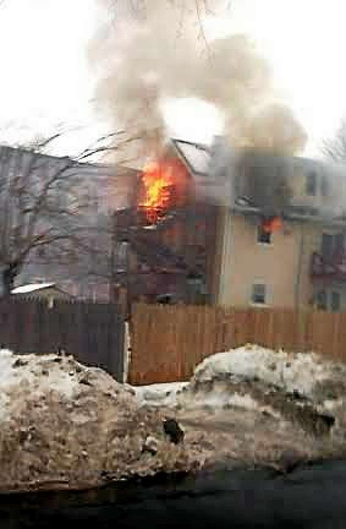Fire at a home on Winthrip Avenue Wednesday.