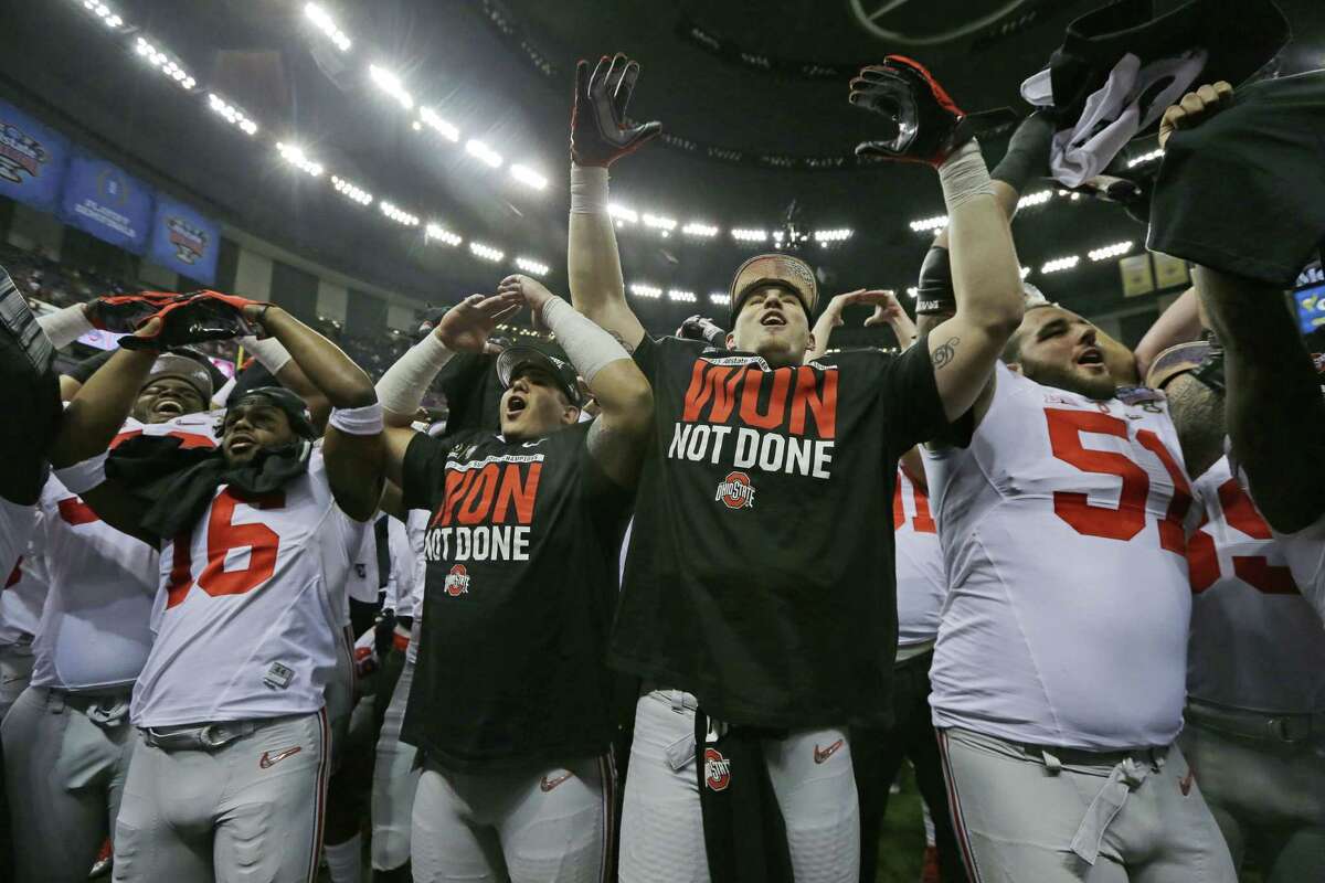 Ohio State players celebrate after their 42-35 Sugar Bowl victory over Alabama on Thursday in New Orleans.