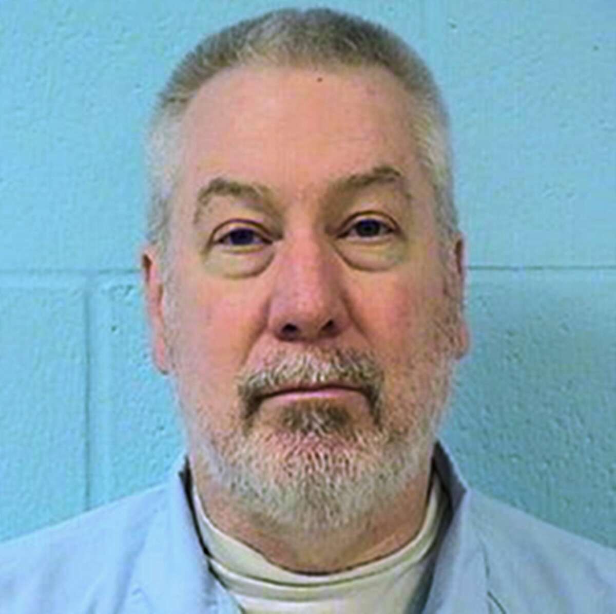 FILE - This undated photo provided by the Illinois Department of Corrections shows Drew Peterson, the former suburban Chicago police officer convicted of killing his third wife and suspected in the disappearance of his fourth. On Tuesday, March 3, 2015, Peterson is expected in court at the Randolph Couty Courthouse in Chester, Ill., for a preliminary hearing on charges that he tried to hire someone to kill the Will County prosecutor who helped put him in state prison. (AP Photo/Illinois Department of Corrections, File)