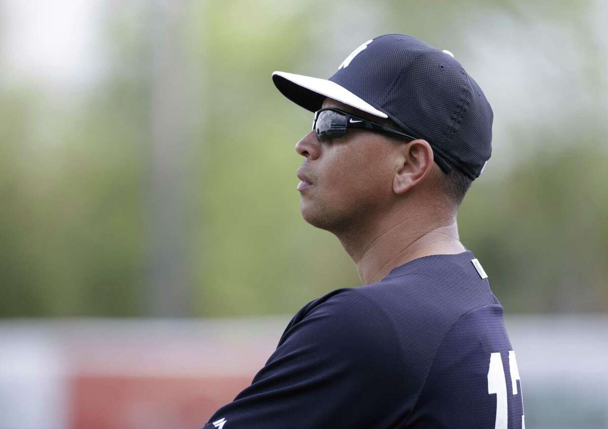 New York Yankees' Alex Rodriguez watches during a spring training baseball workout, Monday, March 2, 2015, in Tampa, Fla. (AP Photo/Lynne Sladky)
