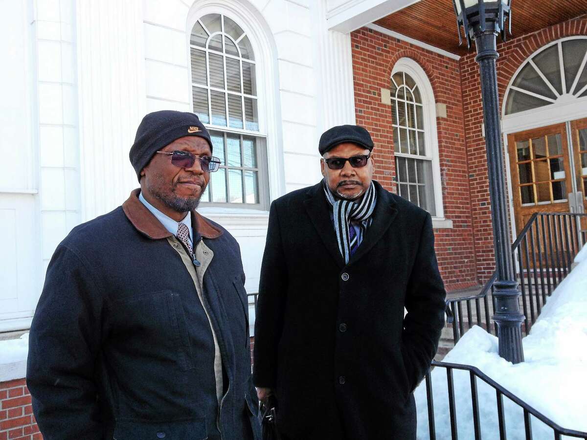 Paul Carty, left, and Burton V. Gifford Jr., attorneys for Matthew Pugh, speak outside court Monday in Milford.
