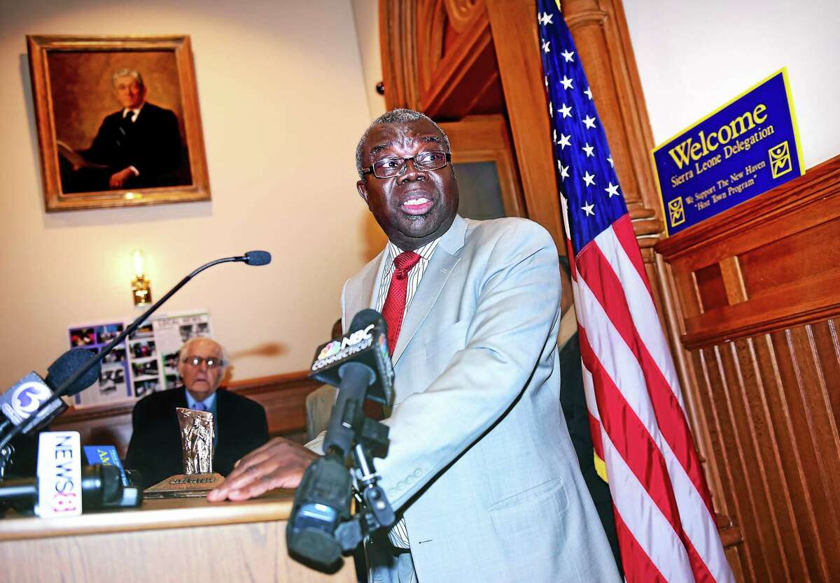 Sierra Leone Ambassador Bockari K. Stevens speaks at a press conference at City Hall in New Haven on 3/2/2015 announcing the donation of vans to be outfitted as ambulances destined for New Haven’s sister city, Freetown, in Sierra Leone.