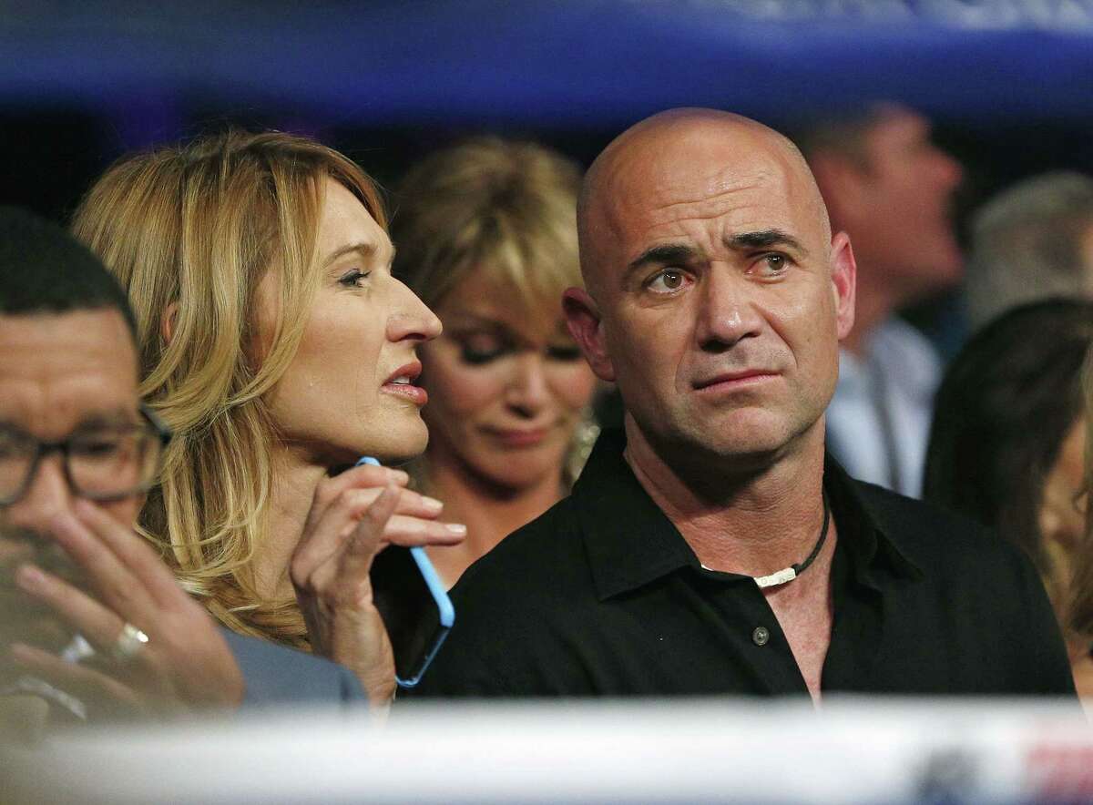 Steffi Graf, left, and Andre Agassi join the crowd before the start of the fight between Floyd Mayweather Jr. and Manny Pacquiao on Saturday in Las Vegas.