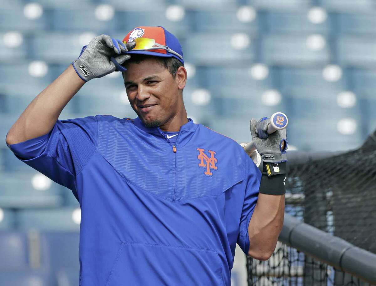 New York Mets center fielder Juan Lagares waits his turn in the batting cage before a spring training game against the New York Yankees last week in Tampa, Fla.