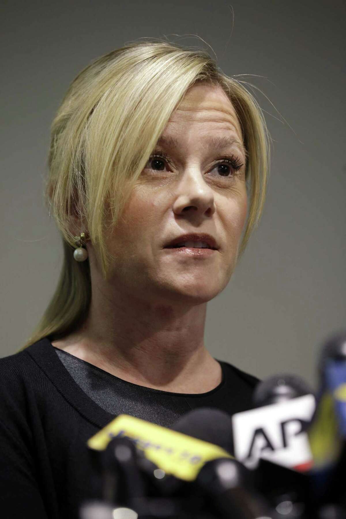 Bridget Anne Kelly, New Jersey Gov. Chris Christie’s former deputy chief of staff, speaks at a news conference where she denied any in the wrongdoing George Washington Bridge traffic scandal, Friday, May 1, 2015, in Livingston, N.J. Earlier Friday, federal prosecutors brought charges against three former allies of Christie, but not Christie himself, in the George Washington Bridge traffic scandal, easing the legal threat that has hung over his 2016 White House ambitions for more than a year. One of those charged, David Wildstein, a former high-ranking official at the transportation agency that operates the bridge, pleaded guilty and accused the two other defendants, Kelly and Bill Baroni, of joining him in the politically motivated scheme to create huge traffic jams. Kelly and Baroni were charged in an indictment unsealed later Friday.