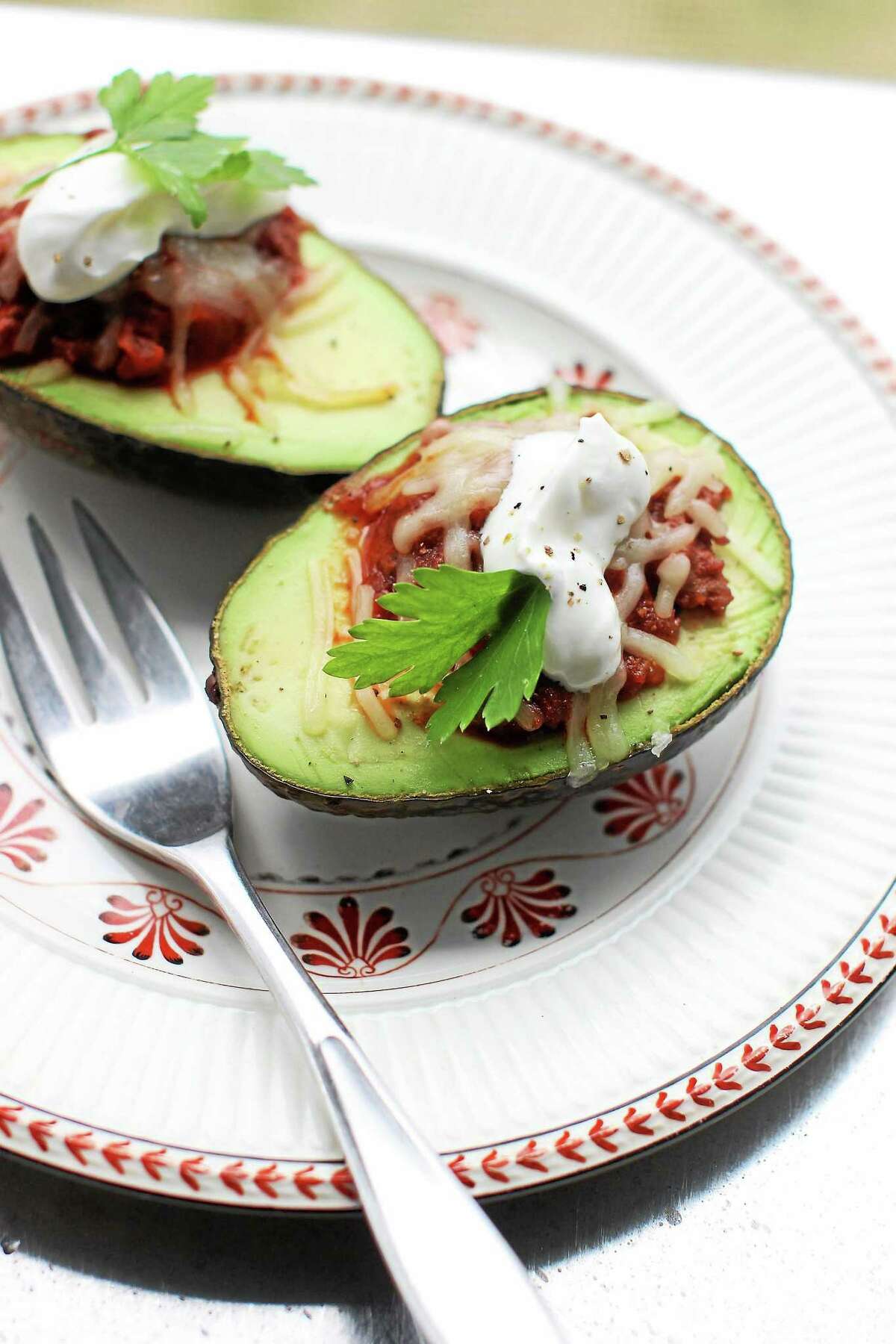 Chili-Stuffed Avocados spend only 5 minutes on the grill.