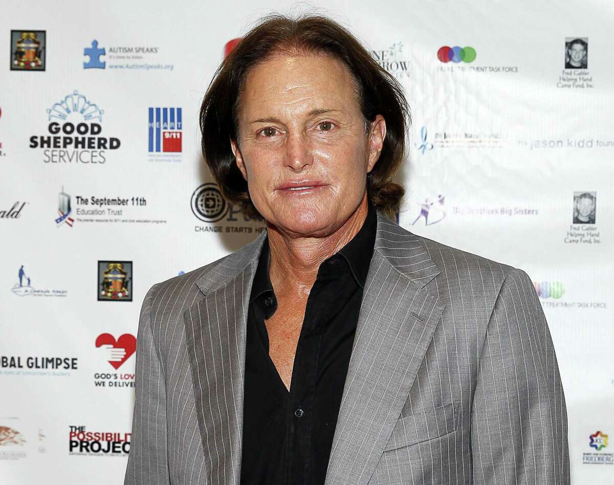FILE - In this Sept. 11, 2013 file photo, former Olympic athlete Bruce Jenner arrives at the Annual Charity Day hosted by Cantor Fitzgerald and BGC Partners, in New York. Jenner was sued in Los Angeles on Friday, May 1, 2015, by the stepchildren of Kim Howe, a woman who died after Jenner’s sport utility vehicle pushed her car into oncoming traffic in a collision on Pacific Coast Highway in February 2015.