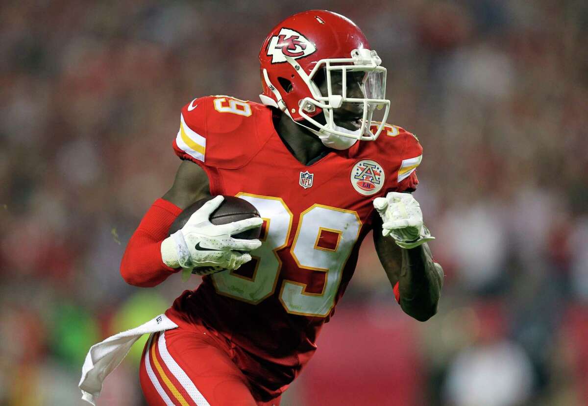 Chiefs free safety Husain Abdullah intercepts a pass and runs it back 39 yards for a touchdown during the fourth quarter of Monday’s 41-14 win over the New England Patriots in Kansas City, Mo.