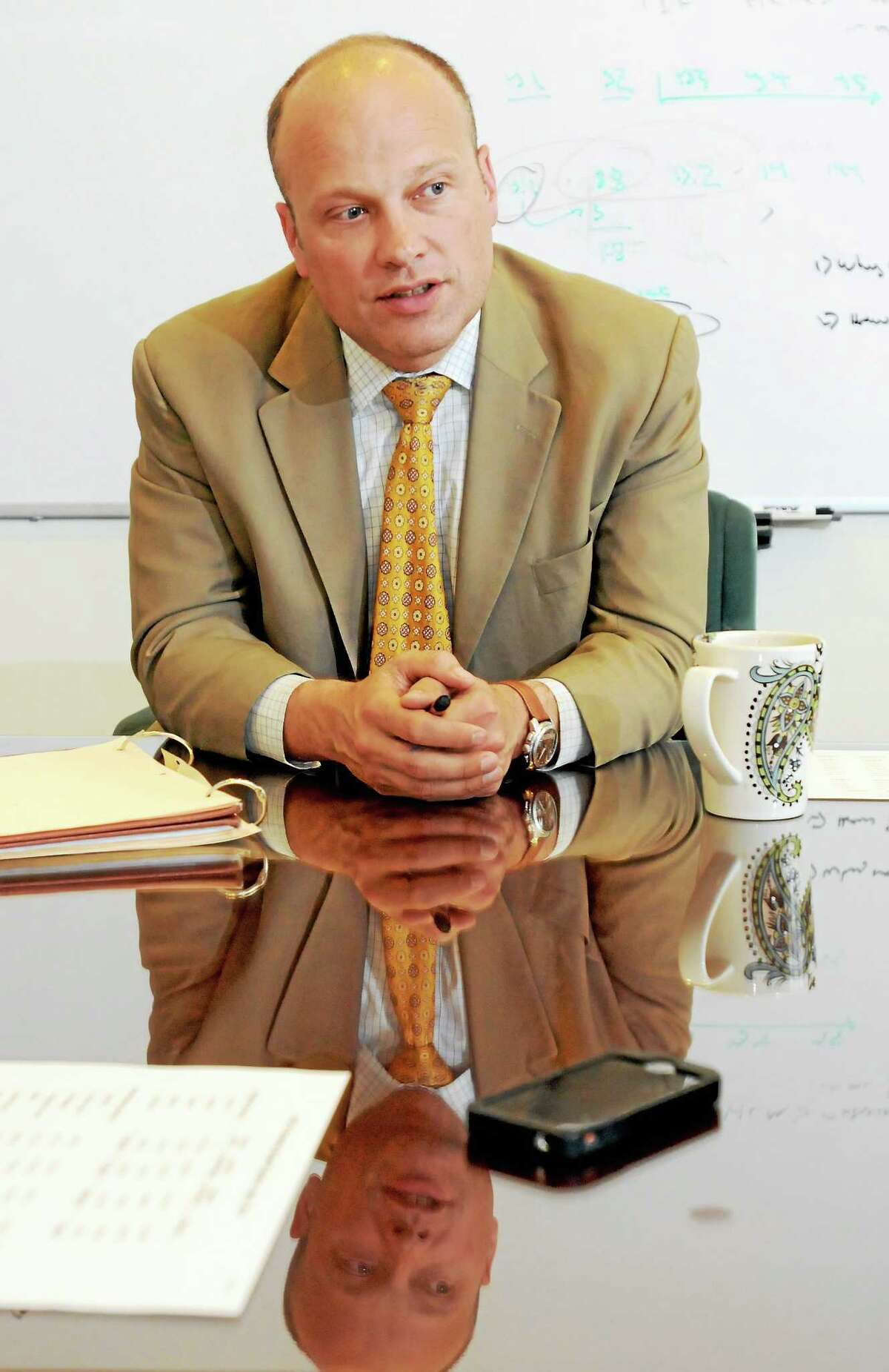 (Peter Hvizdak - New Haven Register) Garth Harries, New Haven Superintendent of Schools, in his office Friday, May 30, 2014, addressing budget gap concerns.