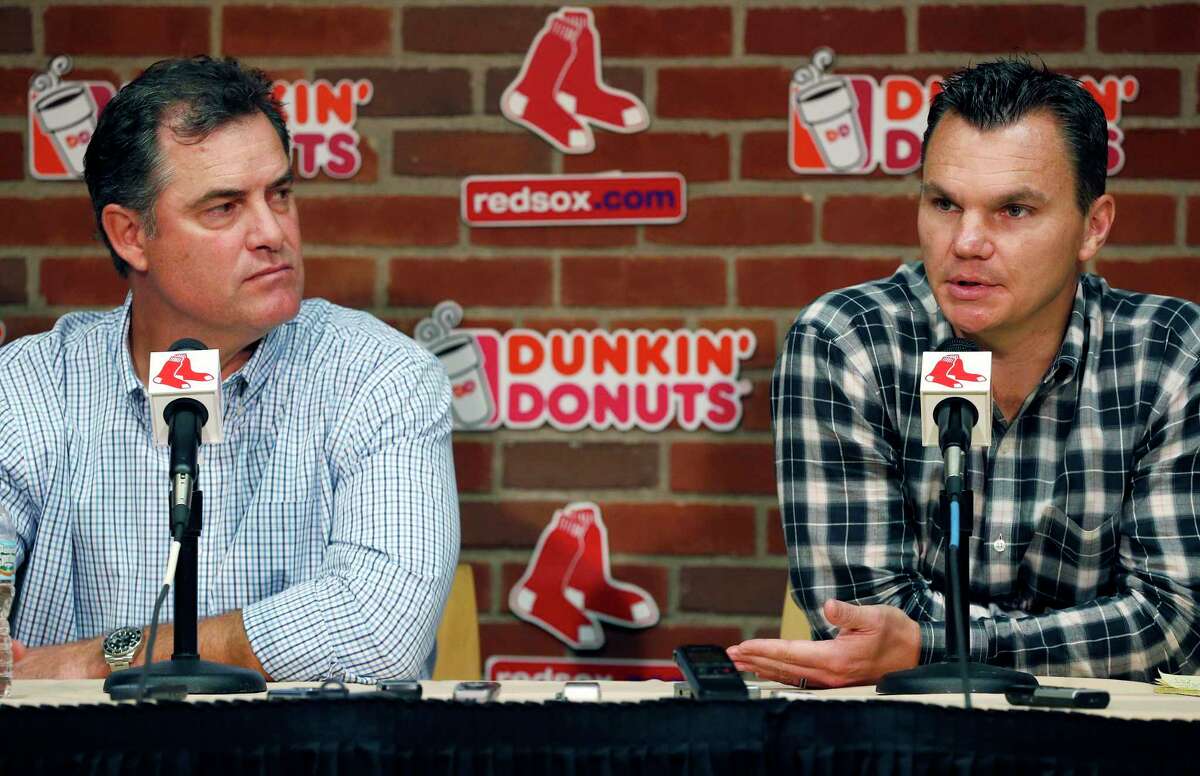 Red Sox manager John Farrell, left, and general manager Ben Cherington speak with reporters during a news conference at Fenway Park on Monday.