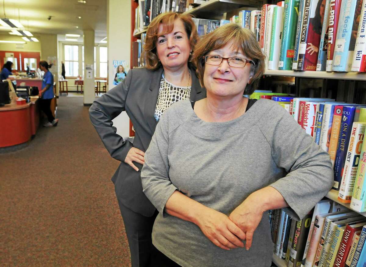 West Haven Library Director Kathy Giotsas, left, and Assistant Director Claudia Volano Thursday, May 29, 2014.