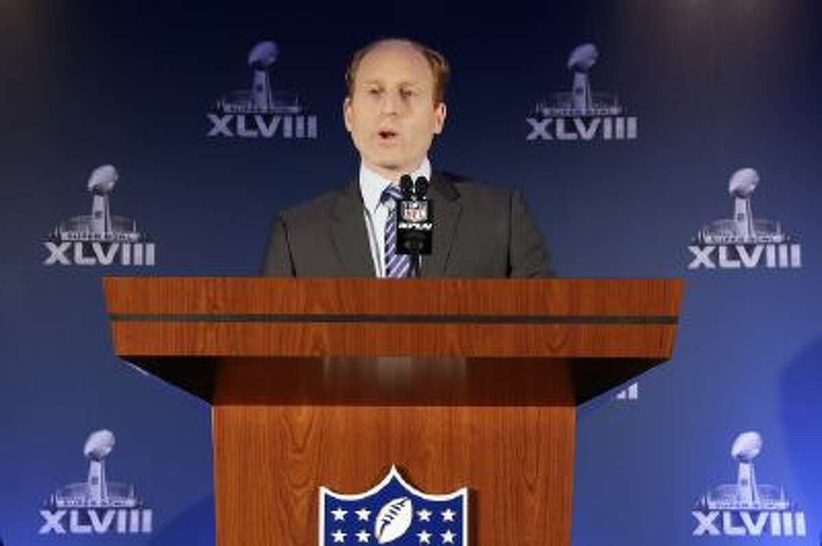 Jeff Miller, with the NFL, speaks during a news conference on health and safety at the NFL Super Bowl XLVIII media center, Thursday in New York.