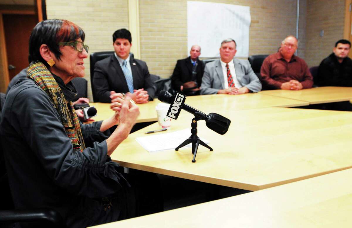 (Peter Hvizdak — New Haven Register) U.S. Rep. Rosa DeLauro has a conversation with constituents at Middletown City Hall in this December file photo.