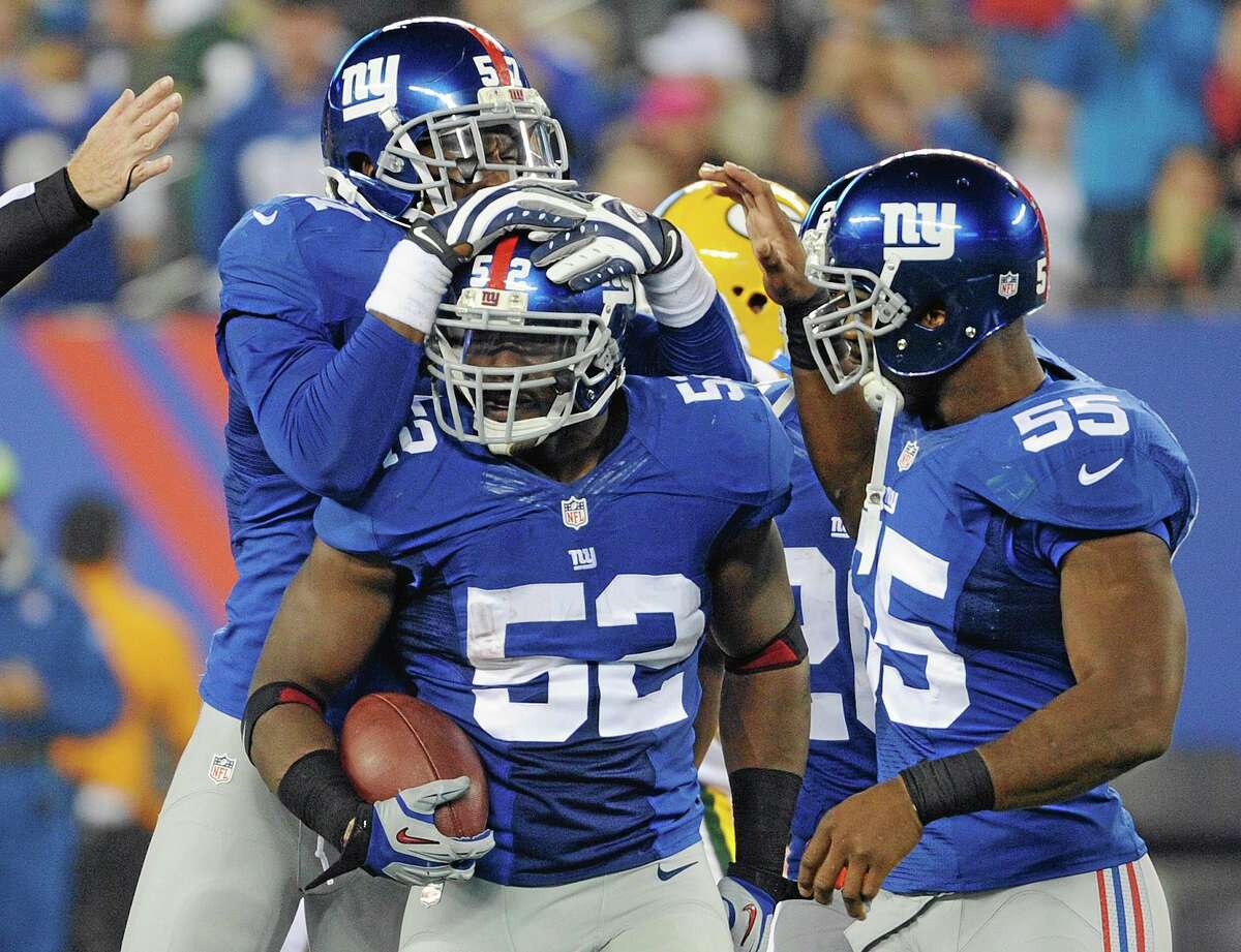 New York Giants linebacker Jon Beason (52) is recovering from a broken bone and torn ligament in his right foot, and won’t be rushed this summer.