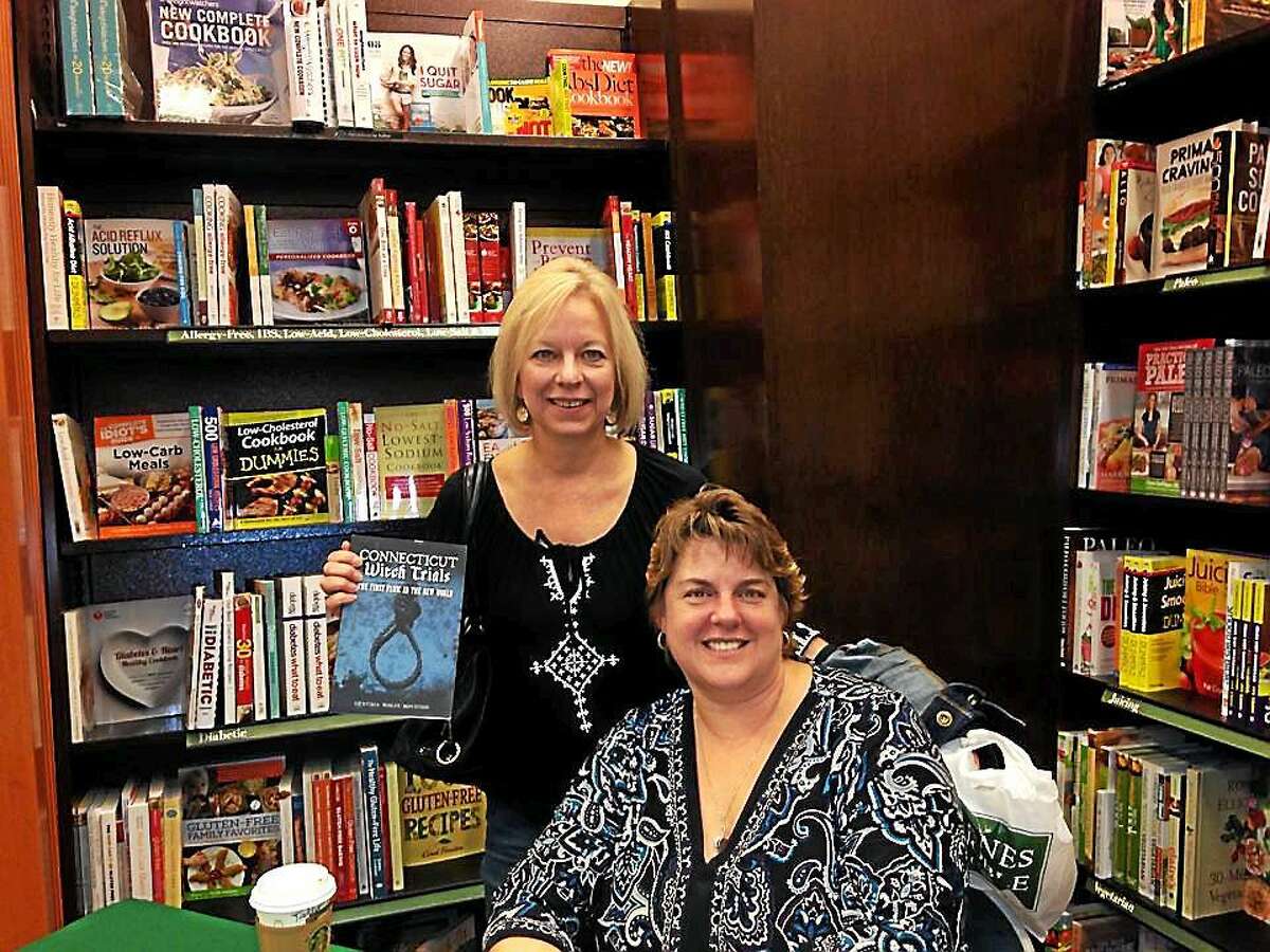 Milford author Cynthia Wolfe Boynton, seated, and Milford resident Marianne Sileo.
