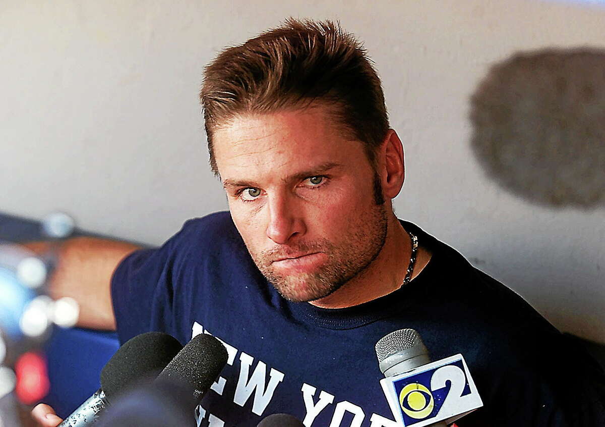 Former New York Yankees second baseman Chuck Knoblauch has been charged with assaulting his ex-wife.