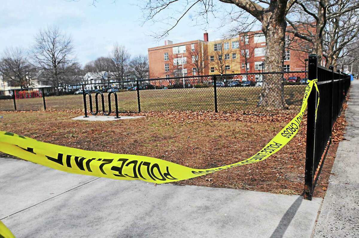 Police tape can be seen Tuesday near Lincoln-Basset Elementary School on Butler Street between Ivy and Lilac streets in New Haven.