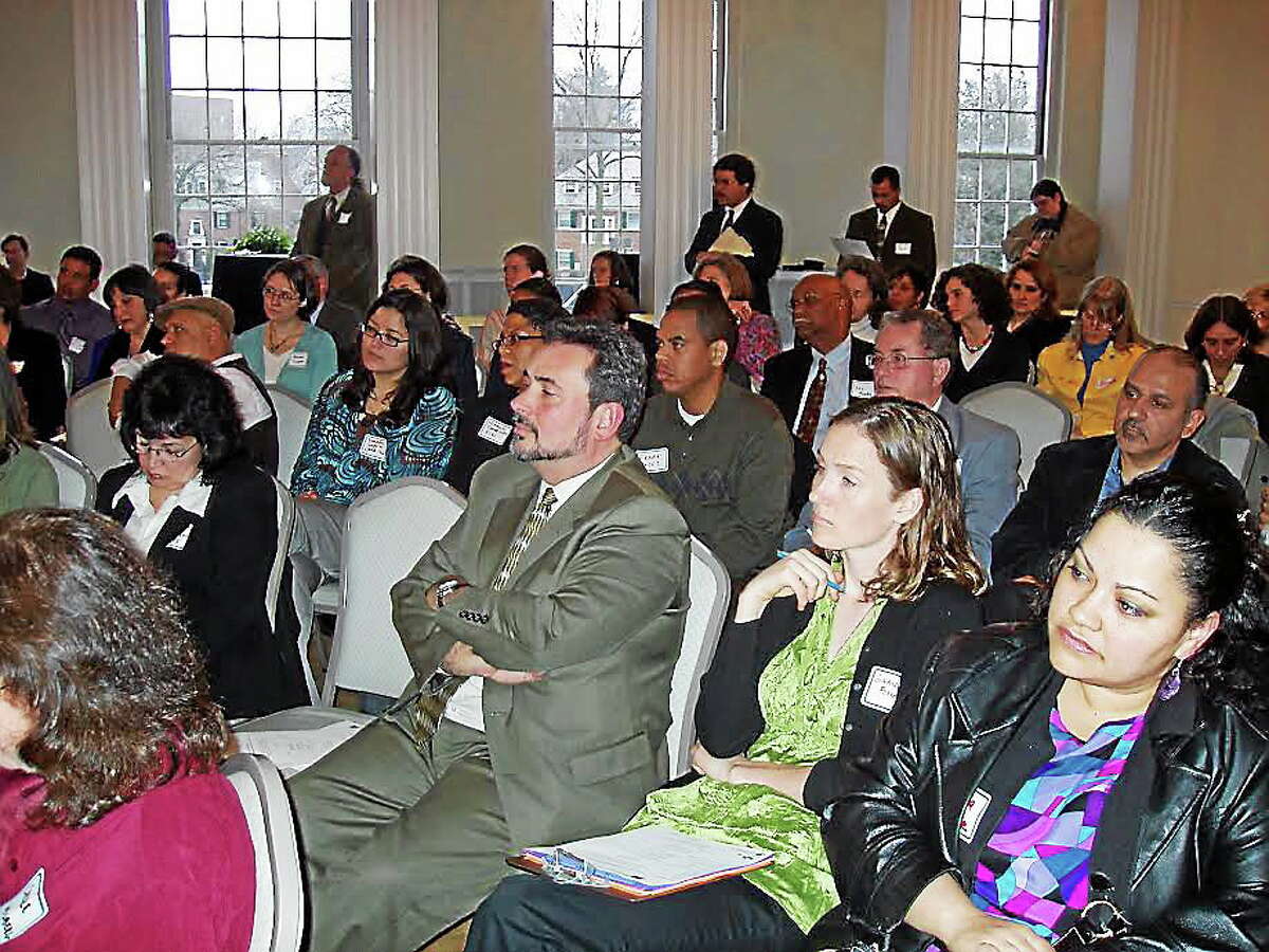 Crowds listen at a past Progreso Latino Fund forum (contributed).