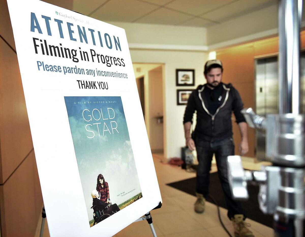 A sign warns passers-by that filming is taking place Monday at Gaylord Hospital in Wallingford.