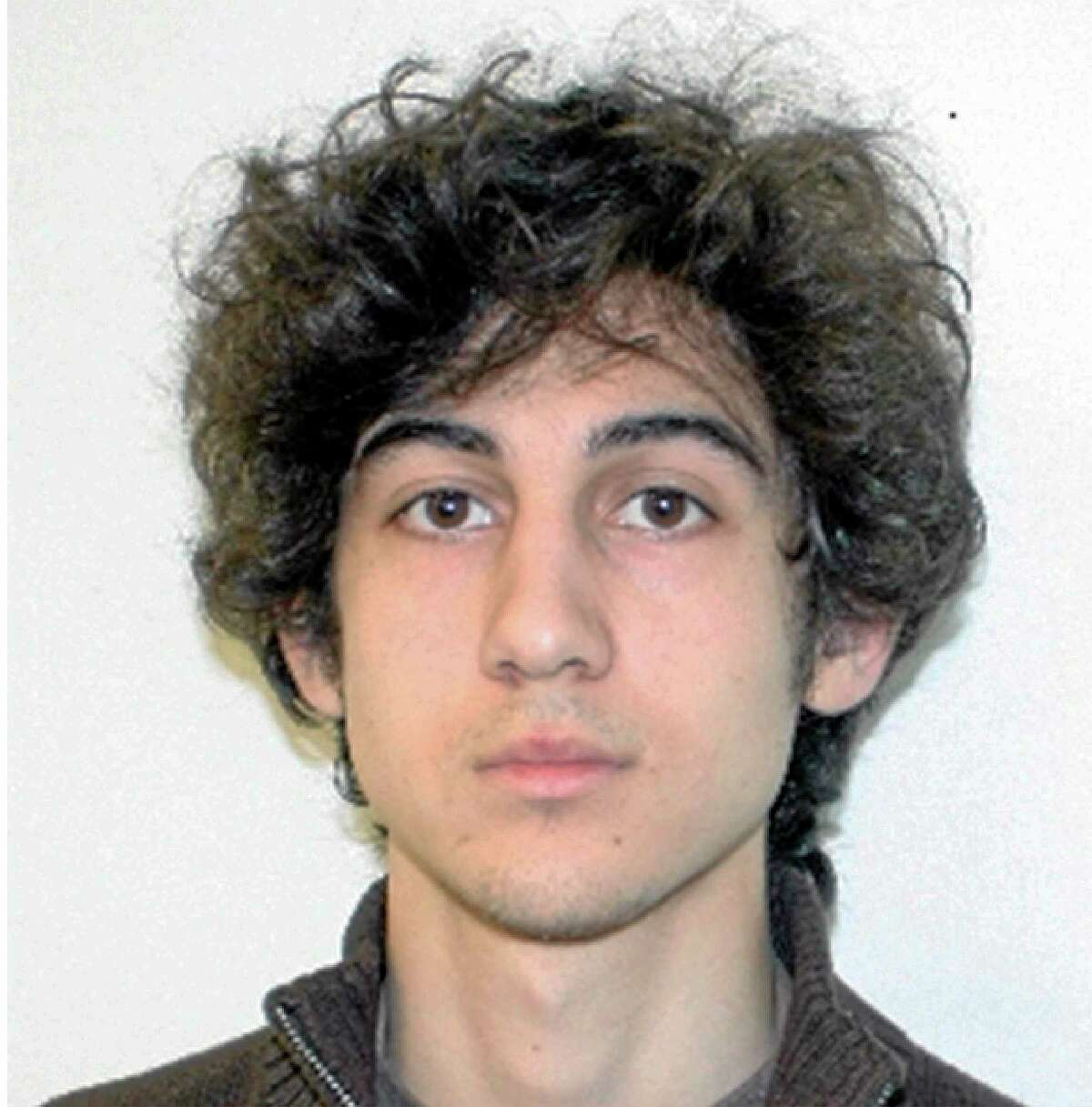 FILE - This file photo provided Friday, April 19, 2013 by the Federal Bureau of Investigation shows Boston Marathon bombing suspect Dzhokhar Tsarnaev. Azamat Tazhayakov, a friend of Tsarnaev, is on trial on obstruction of justice charges, accused with another friend of removing items from Tsarnaev's dorm room. He is not charged with participating in the bombing or knowing about it in advance. (AP Photo/FBI, File)