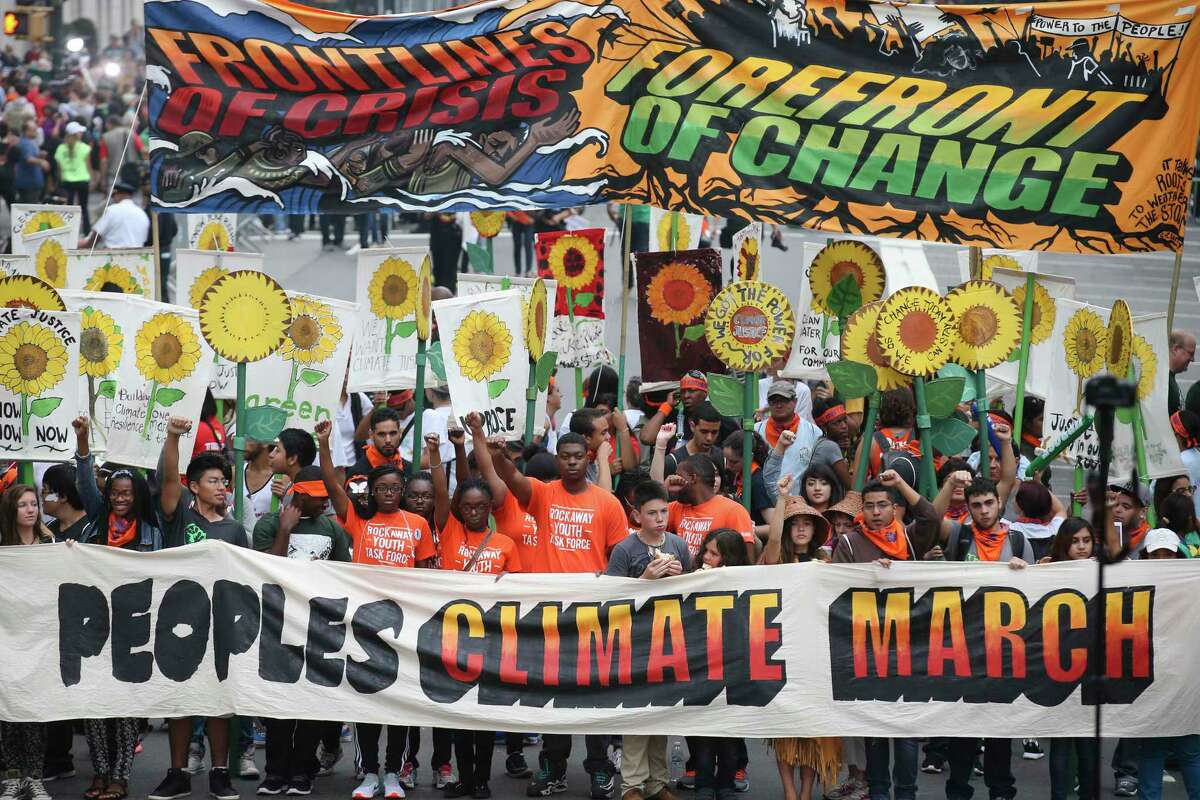 More than 100,000 people march through midtown Manhattan on Sept. 21, 2014 as part of the People’s Climate March, a worldwide mobilization calling on world leaders meeting at the UN to commit to urgent action on climate change and 100% clean energy in New York.