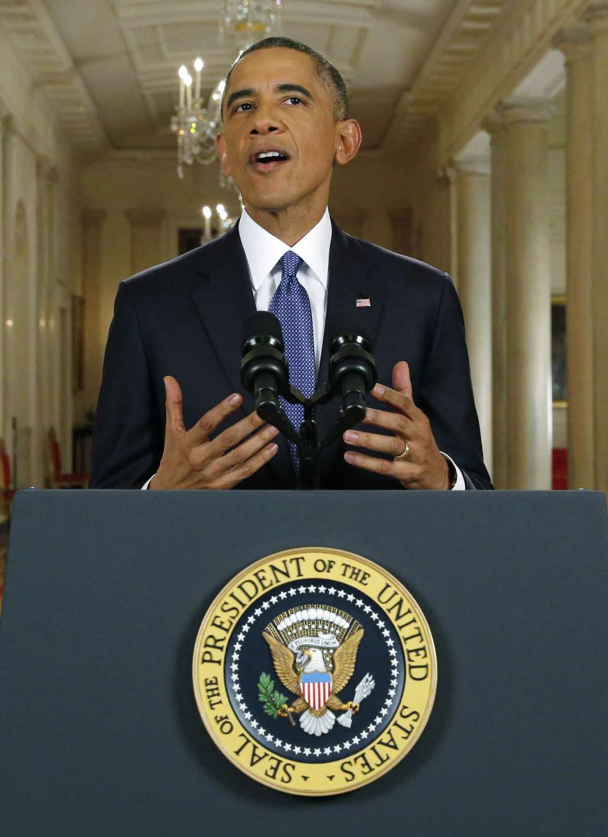 President Barack Obama announces executive actions on immigration during a nationally televised address from the White House in Washington, Thursday, Nov. 20, 2014. Obama outlined a plan on Thursday to relax U.S. immigration policy, affecting as many as 5 million people.