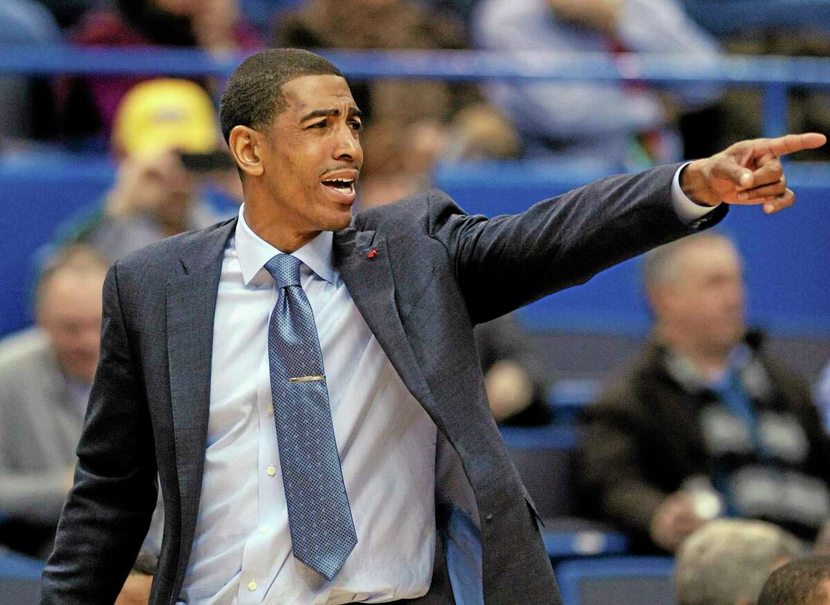 UConn coach Kevin Ollie and the Huskies will face AAC rival Rutgers on Saturday.
