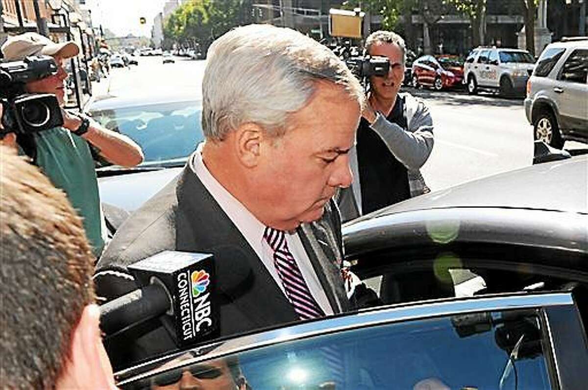 Former Gov. John G. Rowland leaves the Federal Courthouse in New Haven Friday.