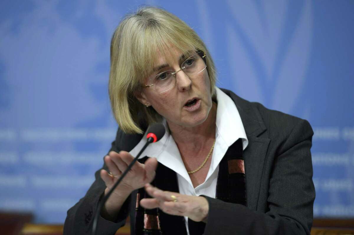 Sally Smith, Community Mobilization Adviser UNAIDS, speaks during a press conference about the fact that the World Health Organization, WHO, has developed new protocol to provide information on the safe management of burial of patients who died from suspected or confirmed Ebola virus disease, at the European headquarters of the United Nations in Geneva, Switzerland, Friday, Nov. 7, 2014. (AP Photo/Keystone,Martial Trezzini)