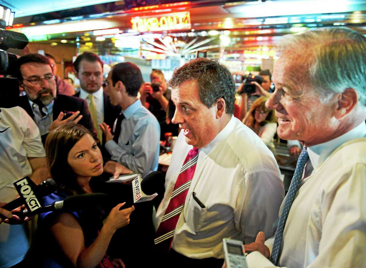 New Jersey Gov. Chris Christie (L) and republican gubernatorial candidate Tom Foley stop at the Glory Days Diner in Greenwich. 7/21