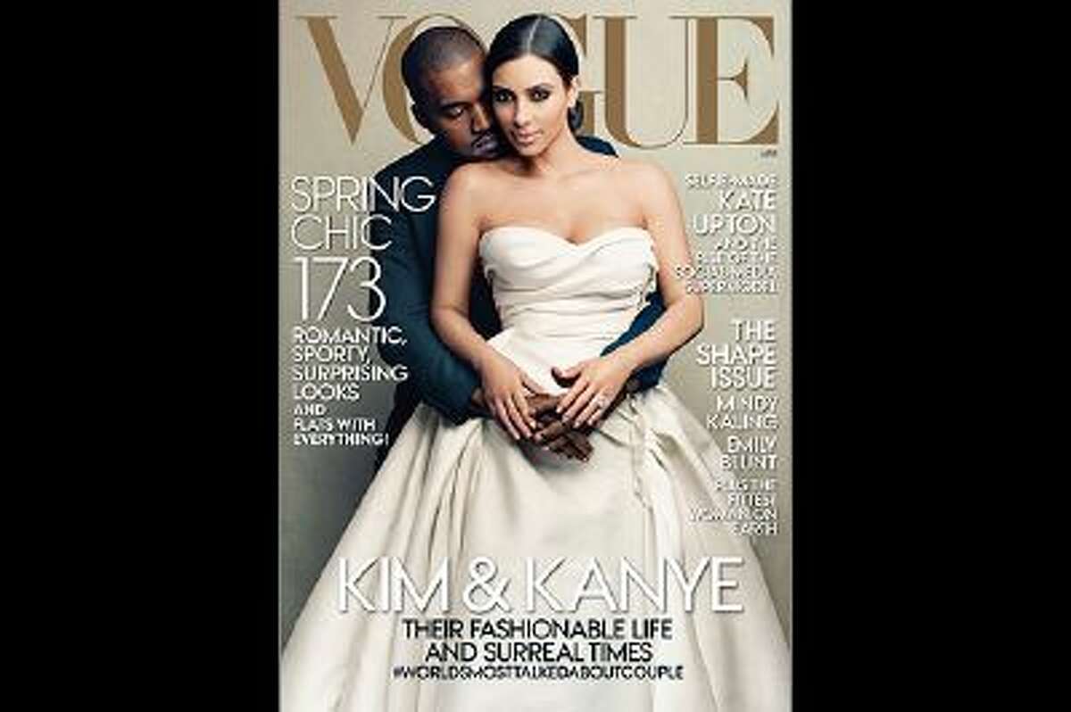 This cover image taken by Annie Leibovitz for Vogue shows the April 2014 issue of the high fashion magazine featuring rapper Kanye West and TV personality Kim Kardashian. The April issue hits newsstands nationwide on March 31 and will be available on March 24 as a digital download for tablets. (AP Photo/Vogue, Annie Leibovitz)