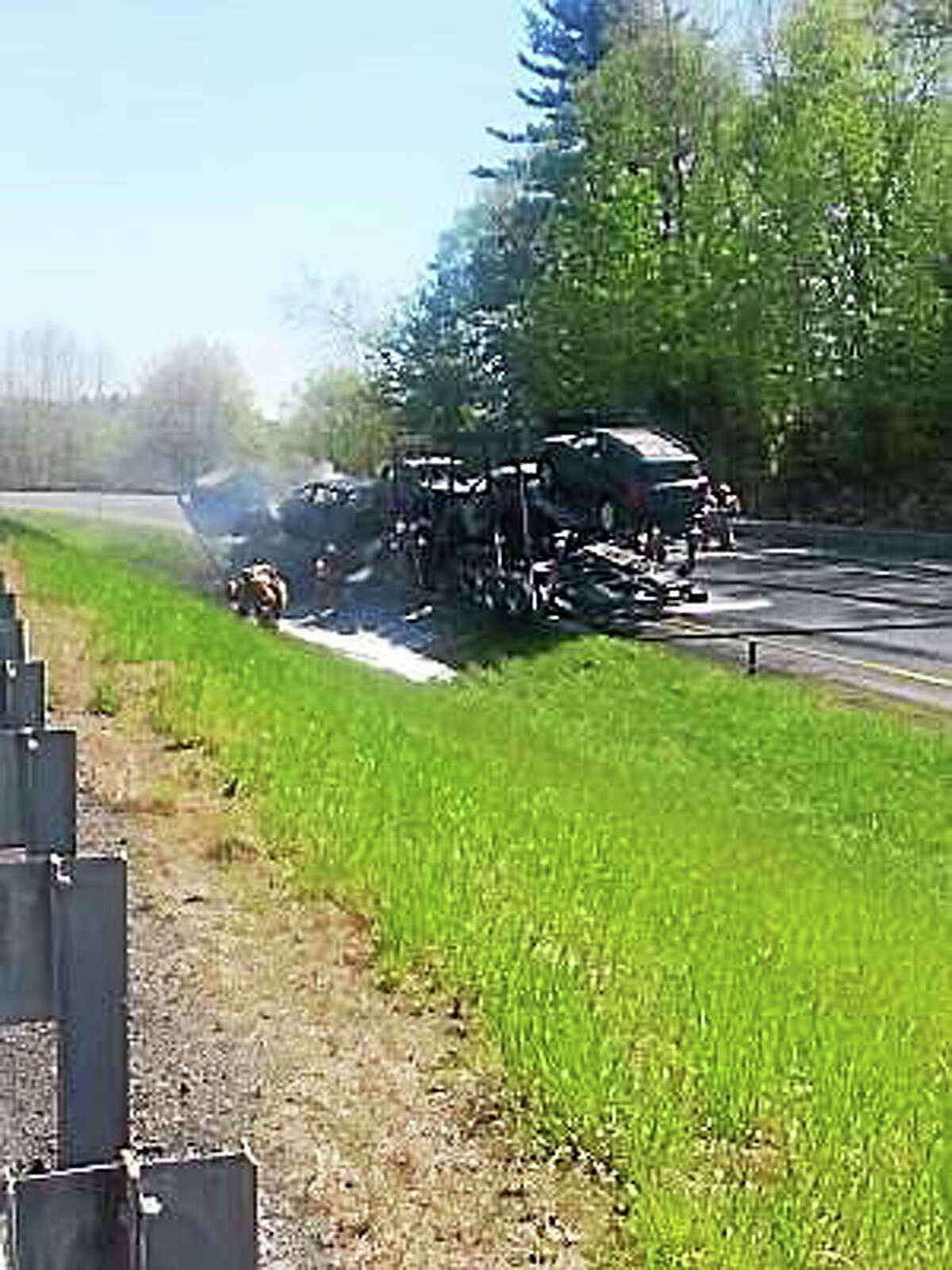 A truck hit the guardrail on Interstate-91 in Vermont, between Exits 4 and 5, and caught fire, forcing the closure of the road for several hours. (Photo courtesy of the Red Cross)