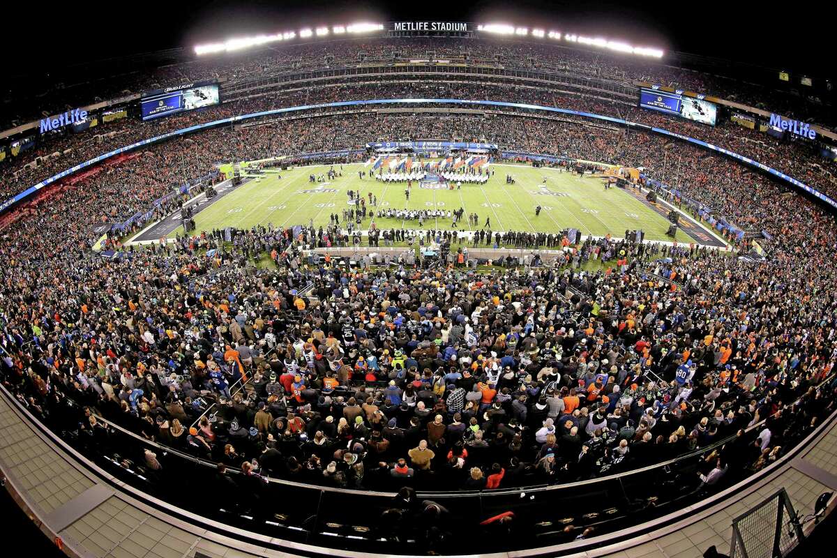 This image made with a fisheye lens shows pregame activity before Super Bowl XLVIII on Feb. 2 in East Rutherford, N.J.